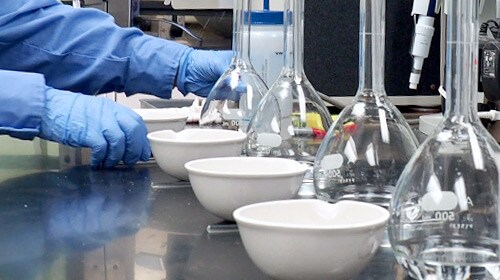 photo of scientist ensuring quality in a sterile environment